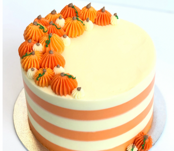 Learn how to make a Gorgeous Pumpkin Inspired Cake at home. Just in time for Halloween!